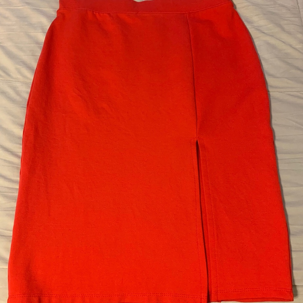 Women’s skirt size large, darker orange shade
